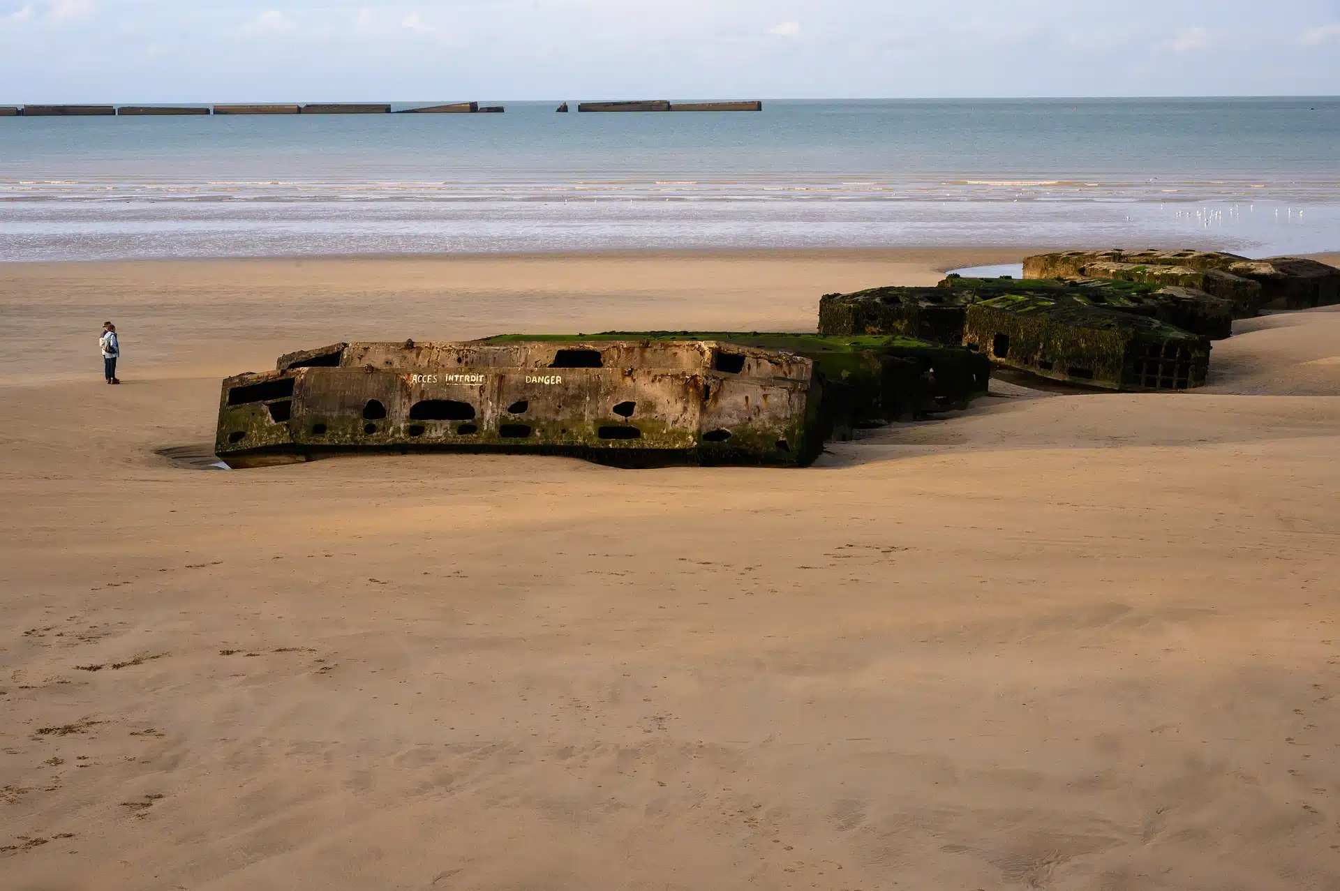The remains of the Mulberry artificial harbour off the coast of Arromanches-les-Bains