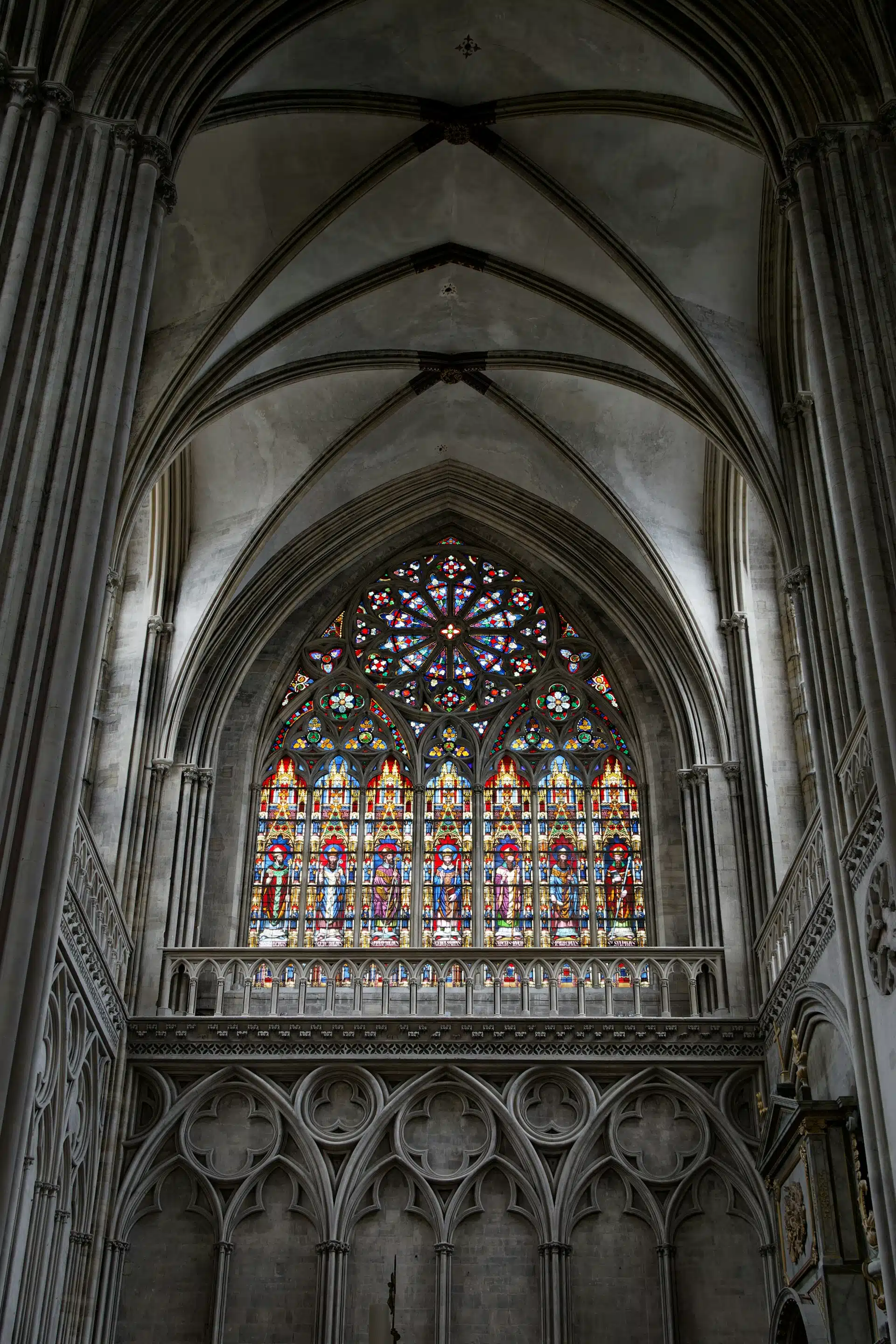 The rose window and stained glass inside Bayeux Cathedral
