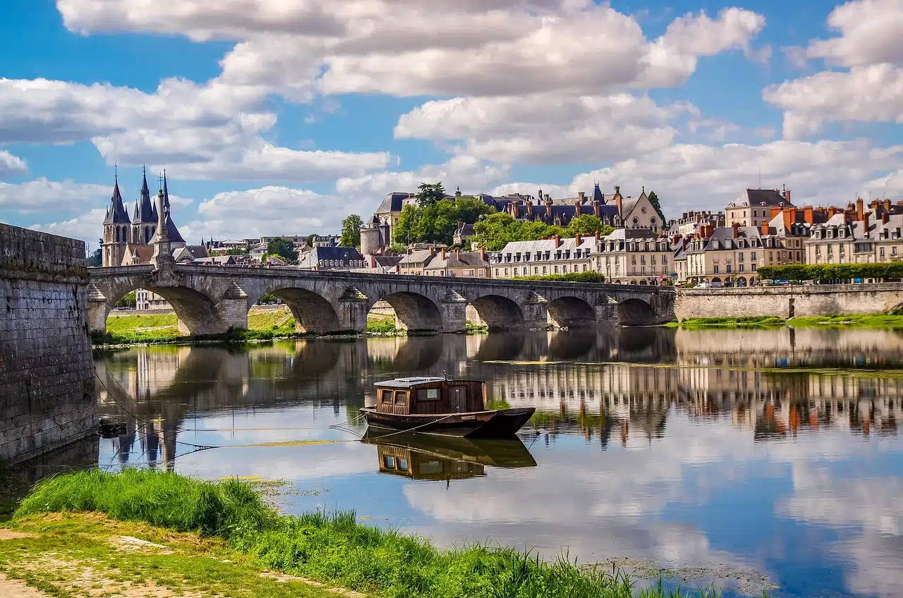 The quays of Blois reflected in the waters of the Loire